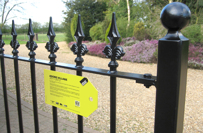Sign affixed to railings